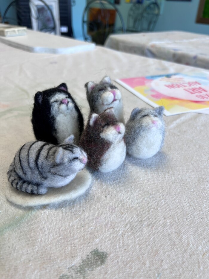 Making needle felted chonky cats at The Artist's Retreat
